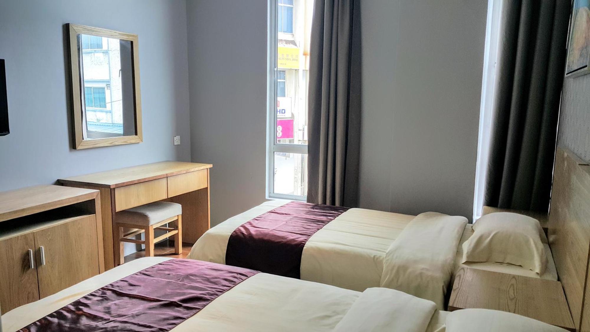 Residence 21 Boutique Inn Miri Kamer foto